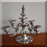 S104. Silverplate four-light candelabra. One arm broken. 